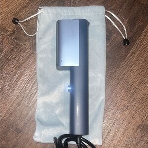 Compact Blue Electronic Device